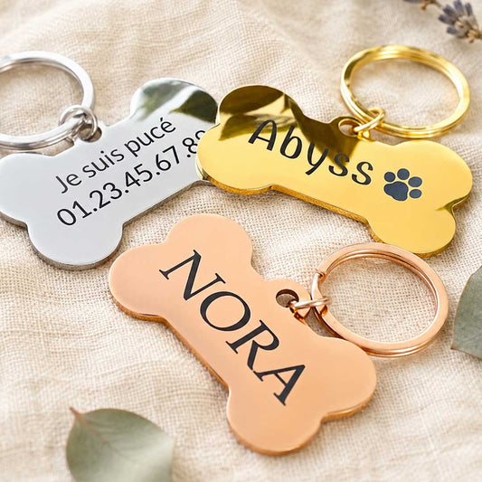 Médaille forme os gravée au laser pour chien en acier inoxydable, personnalisée avec prénom et coordonnées, fabriquée en France par Medaléa